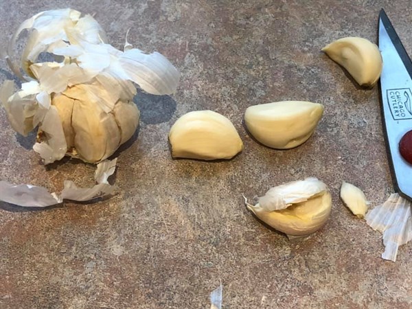 peeling garlic